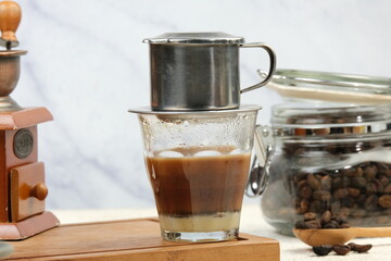 Vietnamese coffee made with a traditional Vietnamese coffee dripper