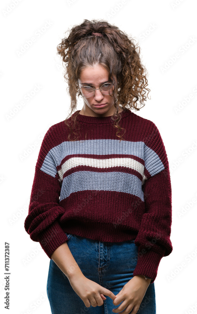 Poster beautiful brunette curly hair young girl wearing glasses over isolated background depressed and worr