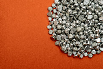 Aluminum tart stones in glass jar