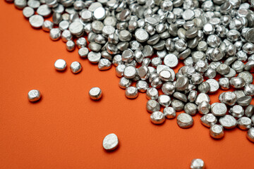 Aluminum tart stones in glass jar