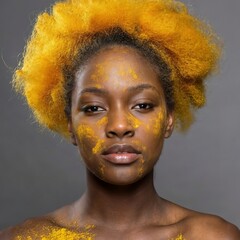 Close up black woman with yellow powder