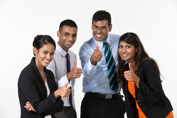 Team of happy Indian business people with Thumbs Up