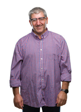 Handsome senior man wearing glasses over isolated background with a happy and cool smile on face. Lucky person.