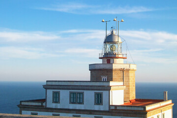Fototapeta na wymiar Finisterre Cape Lighthouse, Costa da Morte, Galicia, Spain. One of the most famous Lighthouse in Western Europe. Last stage in the Camino de Santiago.