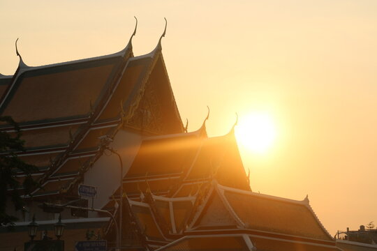 buddhist temple at sunset