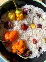 Colorful chilli and pepperoni peppers in rice  for dry. Selected focus.