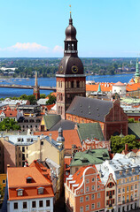 Riga Cityscape In Sunny Summer Day. Famous Landmark - Riga Dome Cathedral