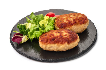 Roasted meatballs in breadcrumbs with mix salad, close-up, isolated on a white background.