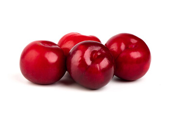 Fototapeta na wymiar Red plum fruits, isolated on white background.
