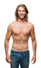 Fototapeta premium Young handsome shirtless man with long hair showing sexy body over isolated background with a happy and cool smile on face. Lucky person.