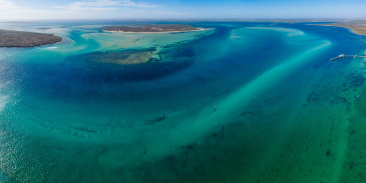 Aerial panorama of islands and channels in a calm blue bay