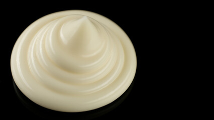 White cream isolated on black background