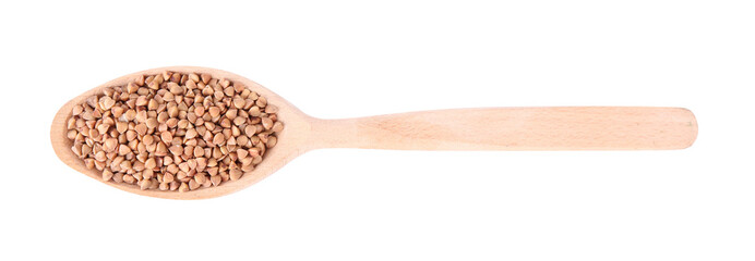 Spoon with raw buckwheat isolated on white, top view