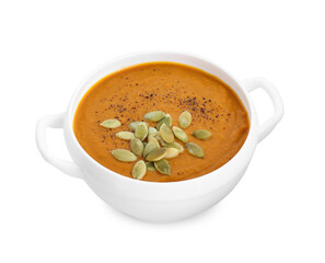 Delicious pumpkin cream soup with seeds in bowl isolated on white