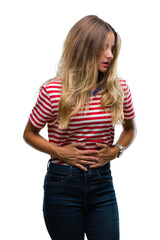 Young beautiful blonde woman over isolated background with hand on stomach because indigestion, painful illness feeling unwell. Ache concept.