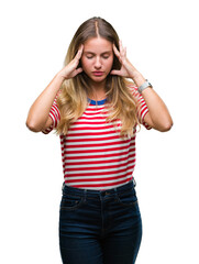 Young beautiful blonde woman over isolated background with hand on head for pain in head because stress. Suffering migraine.