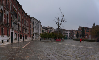 Venezia market center with old house facade 