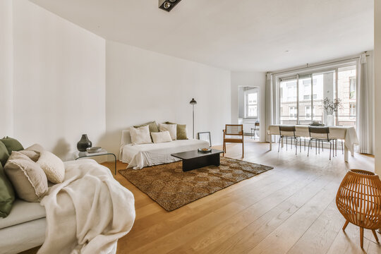 Fototapeta Modern minimalist living room with natural light