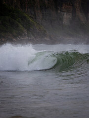 Beautiful breaking wave at the beach.