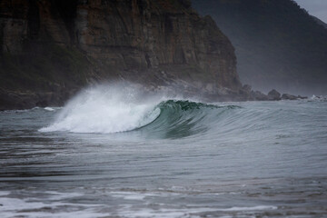 Beautiful breaking wave at the beach.