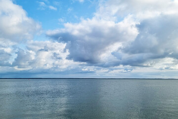 Picturesque views of the clouds and the sea. Outdoor recreation.