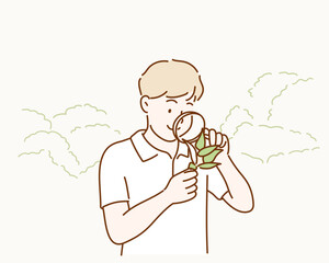 A Little Kid Using Magnifier. Hand drawn style vector design illustrations.