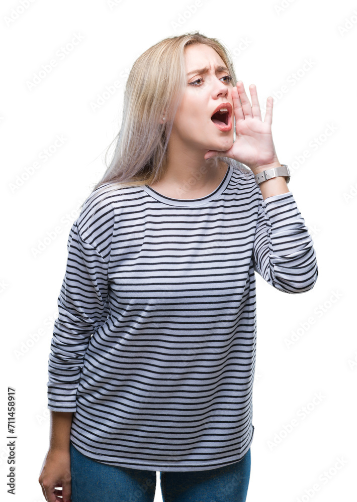 Poster young blonde woman over isolated background shouting and screaming loud to side with hand on mouth. 