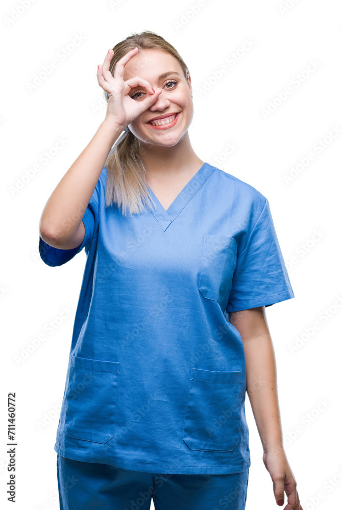 Poster young blonde surgeon doctor woman wearing medical uniform over isolated background doing ok gesture 