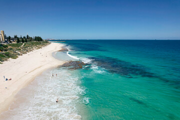 Beautiful white sand and blue water of North Cottesloe Beach in Perth