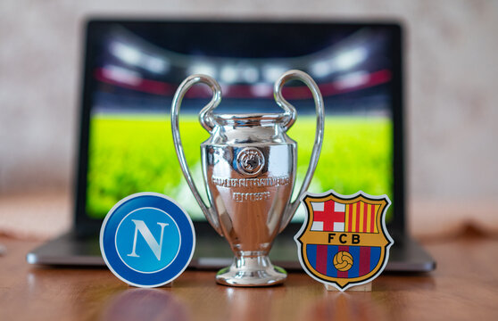 January 3, 2024, London, United Kingdom. The emblems of the football clubs participating in the UEFA Champions League playoffs FC Barcelona and SSC Napoli.