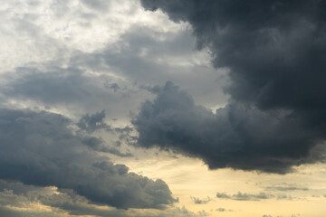 Dramatic sky with storm clouds before rain. Panoramic view of the stormy sky and dark clouds. Concept on the theme of weather, natural disasters. High quality photo