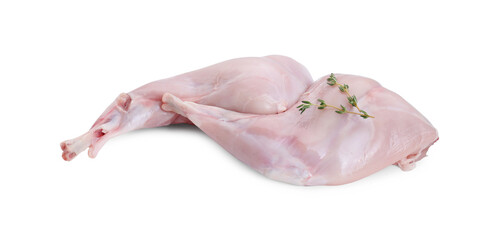 Fresh raw rabbit legs and thyme isolated on white