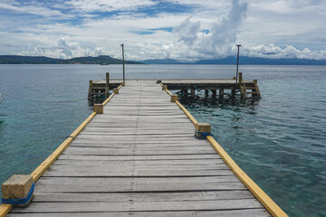 Fototapeta premium Wooden Bridge in Tulehu, Central Maluku, Indonesia