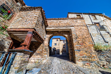 Street and medieval arc in Yanguas village. Soria. Spain. Europe.