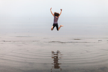 Serene Attitude Young Adult Woman Jump Into Sea Water Wet Beach Barefoot
