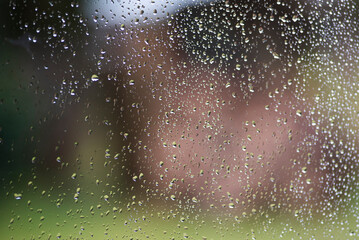 Raindrops on the window glass, raindrop texture.