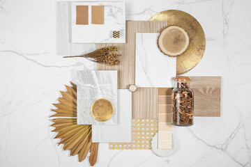 White and gold color composition of different types of materials for interior design and decoration