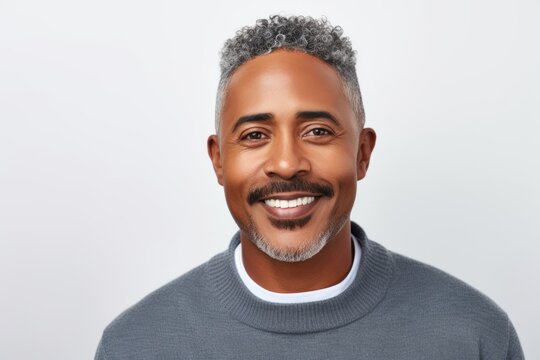 Portrait of handsome african american man in grey sweater.