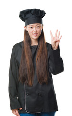 Young Chinese woman over isolated background wearing chef uniform showing and pointing up with fingers number four while smiling confident and happy.