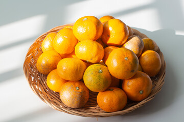 Tangerines on the wooden tray