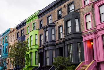 Fototapeta premium london the uk england britain colorful houses buildings notting hill portobello road elegant posh yellow purple pastel cute lovely winter 