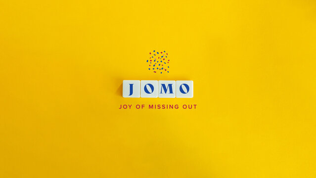 JOMO, or Joy of Missing Out Phrase and Concept Image. 