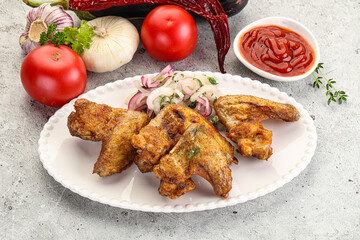 Grilled chicken wings with sauce