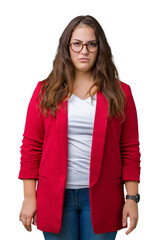 Beautiful plus size young business woman wearing elegant jacket and glasses over isolated background skeptic and nervous, frowning upset because of problem. Negative person.