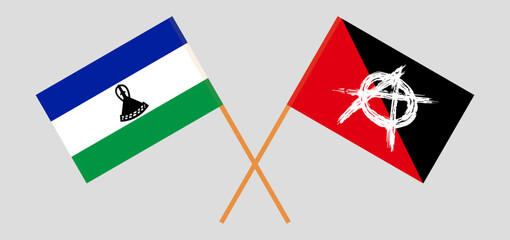 Crossed flags of Lesotho and anarchy. Official colors. Correct proportion