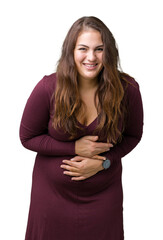 Beautiful and attractive plus size young woman wearing a dress over isolated background Smiling and laughing hard out loud because funny crazy joke. Happy expression.