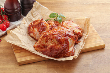 Marinated chicken leg in tomato sauce