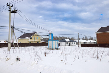 An electric substation on a site in a Siberian village