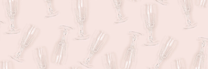 Banner with pattern made of crystal glasses on a beige background.