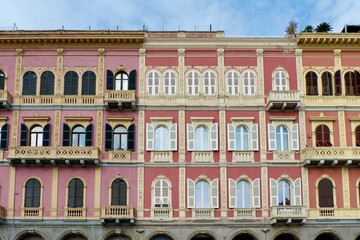Fototapeta na wymiar Rich Italian houses seen from outside in Cagliary, Italy. Colourful Italian vintage architecture